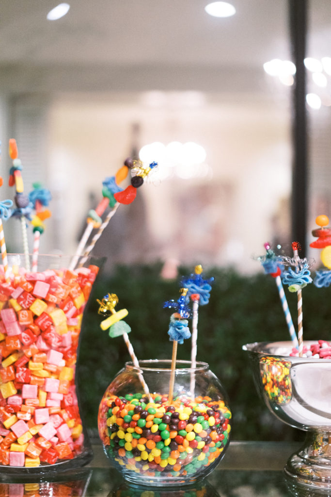 Candy display in glass jars during New Orleans wedding