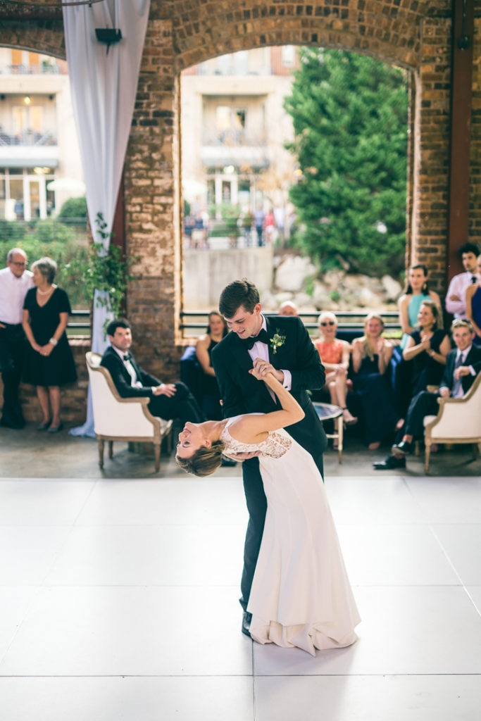 bride and groom dancing to first dance