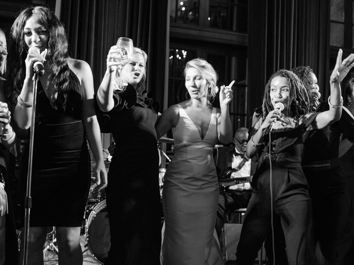 Bride on stage with Virginia wedding band Kustom Made