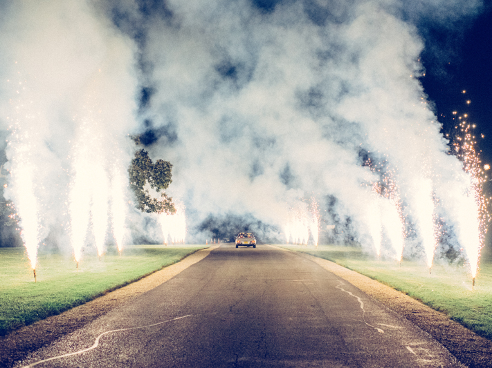 Vintage car exiting Dover Hall wedding