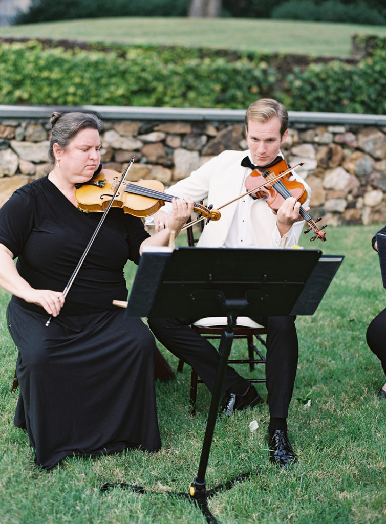 String quartet performing outside at Dover Hall wedding