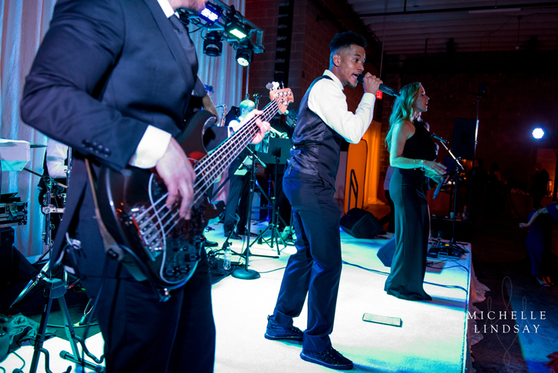 Modern Luxe band performing during wedding reception at Union Market