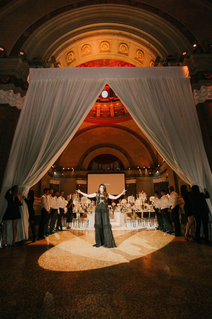 Opera singer performing at Vera Wang event in NYC.