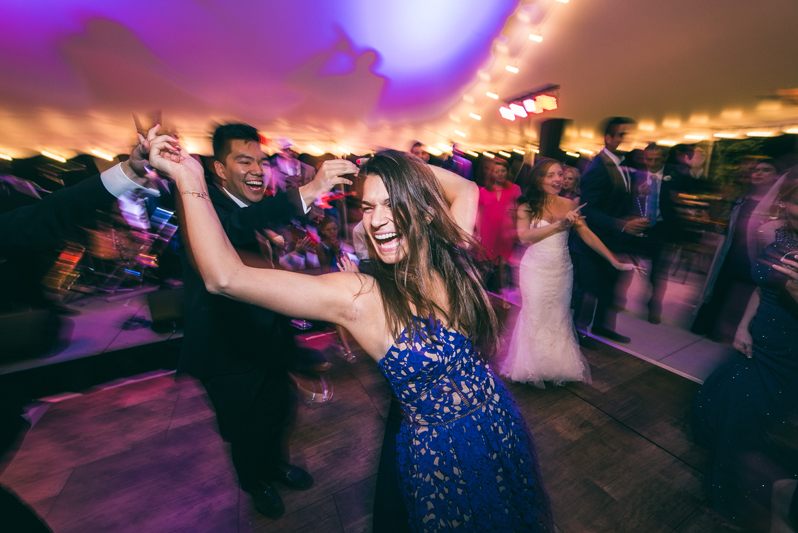 Couple laughing and dancing during wedding reception at Summerfield Farms.