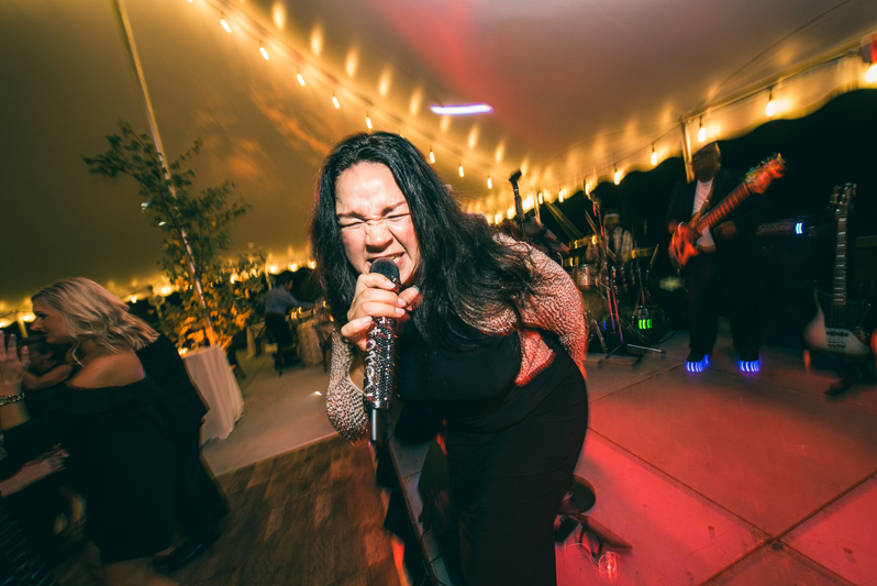 Right to Party band lead vocalist singing at Summerfield Farms wedding reception.