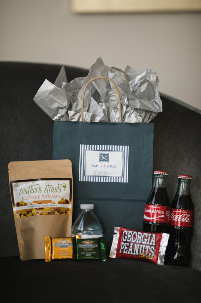 Wedding welcome gift bag with coca cola and snacks.