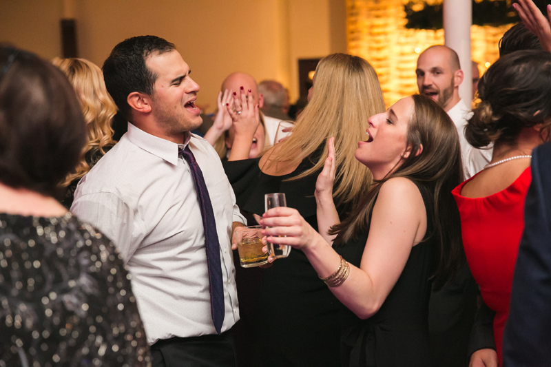 Guests singing and dancing during wedding reception at The Stave Room.