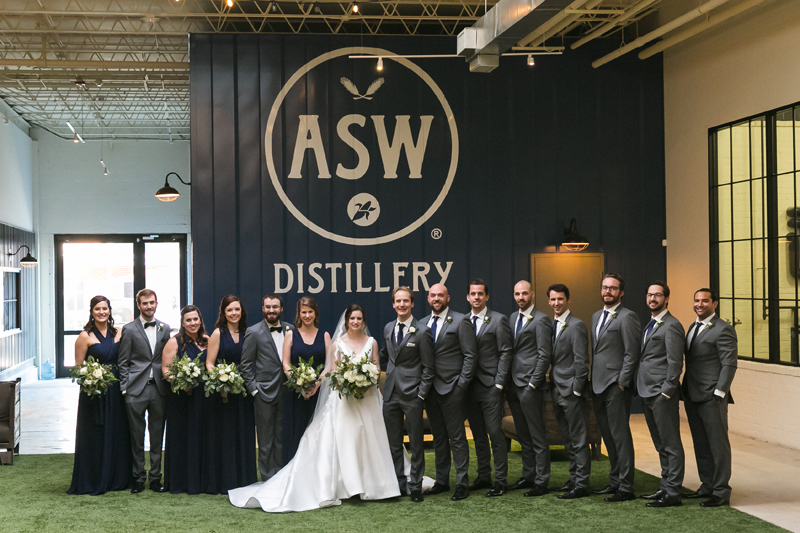 Bride, groom and wedding party as ASW Distillery wedding.