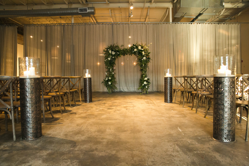 Wedding ceremony setup at Atlanta distillery wedding.