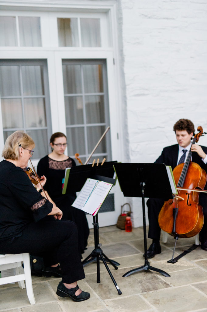 String musicians playing during ceremony at Roaring Gap Club.