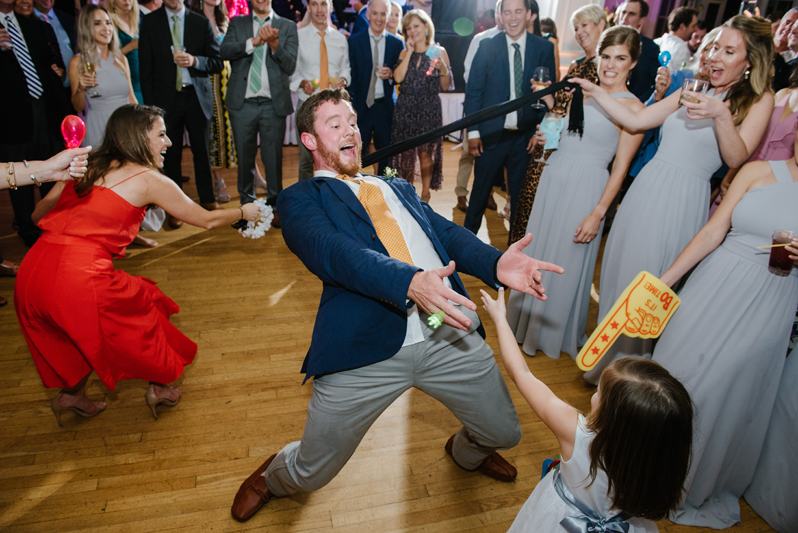 Wedding guest dancing during Roaring Gap Club wedding.