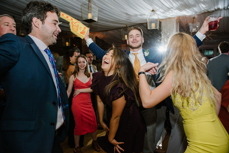 Crowded dance floor at Roaring Gap Club wedding reception.