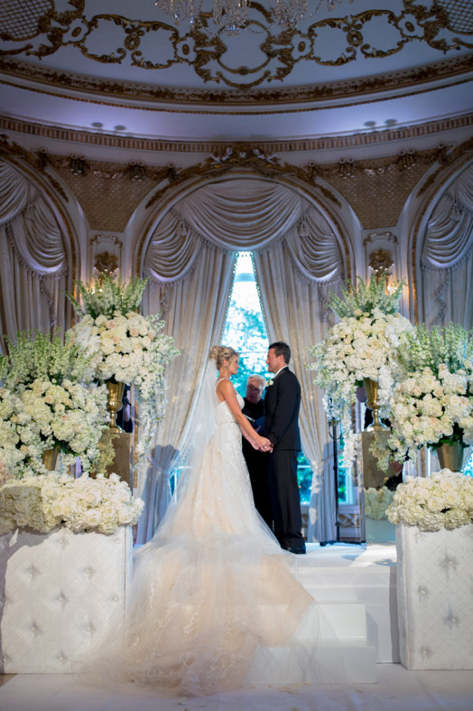 Bride and groom during ceremony at Palm Beach wedding.