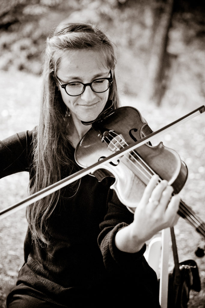 Violinist performing at wedding ceremony at Biltmore Estate.