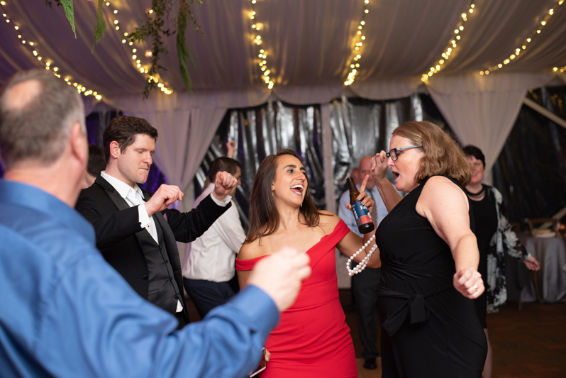 Guests dancing to Bantum Rooster band at Biltmore wedding reception.