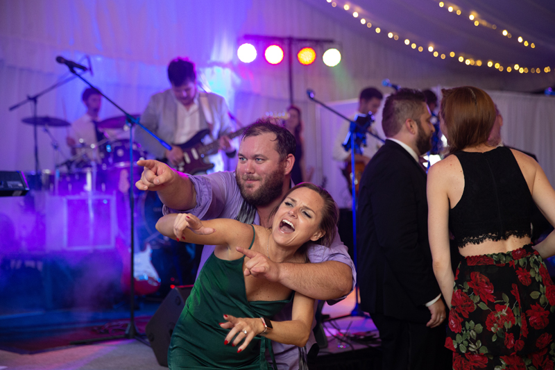 Guests dancing at wedding reception at Biltmore Estate.