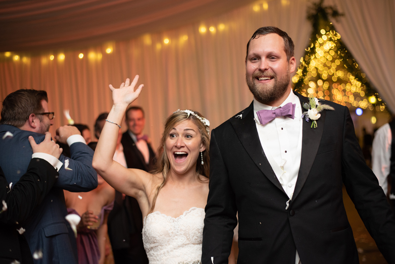 Bride and groom exiting Biltmore wedding reception.