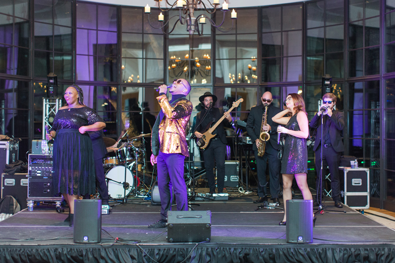 Kiawah Island Club wedding reception with The Royals band performing on stage.