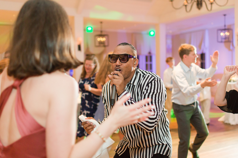 Lead male vocalist for The Royals band performing on dance floor at Kiawah Island Club wedding.