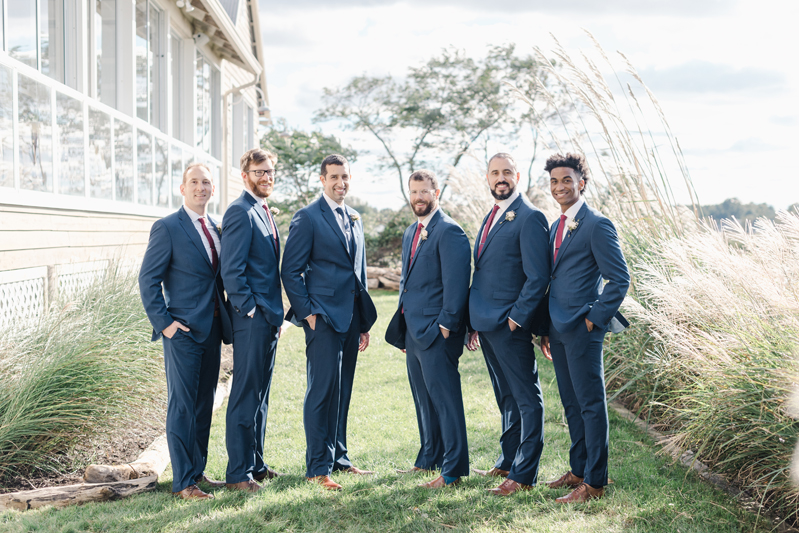Groom and groomsmen at Bride and groom dancing The Hora at Jewish wedding at Chesapeake Bay Beach Club wedding.