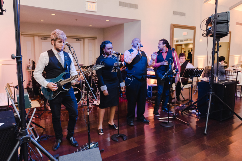 Broadsound band performing during wedding reception at Bride and groom dancing The Hora at Jewish wedding at Chesapeake Bay Beach Club.
