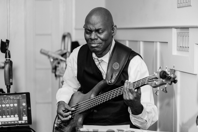 Guitarist from Broadsound band performing at Bride and groom dancing The Hora at Jewish wedding at Chesapeake Bay Beach Club wedding reception.