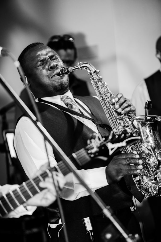 Sax player from Broadsound band performing at Bride and groom dancing The Hora at Jewish wedding at Chesapeake Bay Beach Club wedding reception.