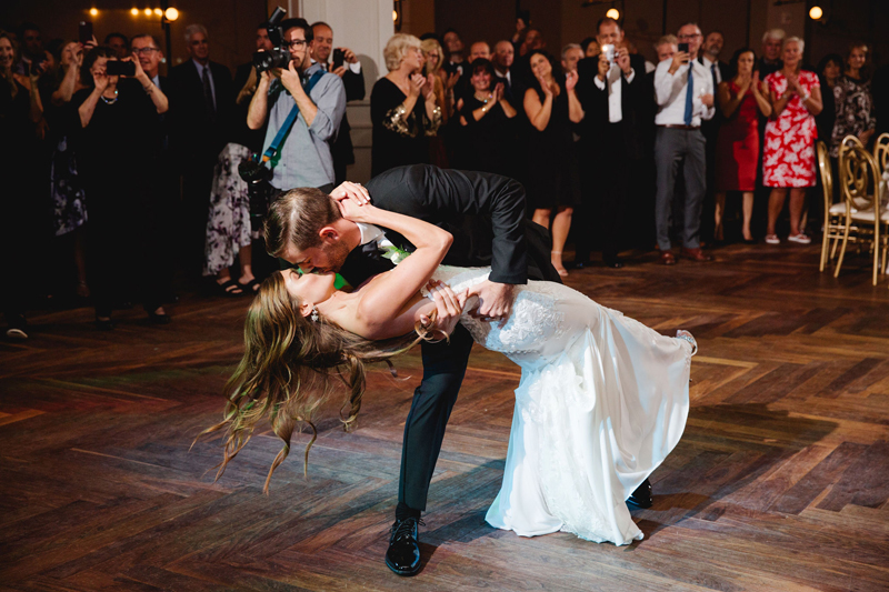 Groom dipping bride on the dance floor during their Philadelphia wedding at The Lucy.