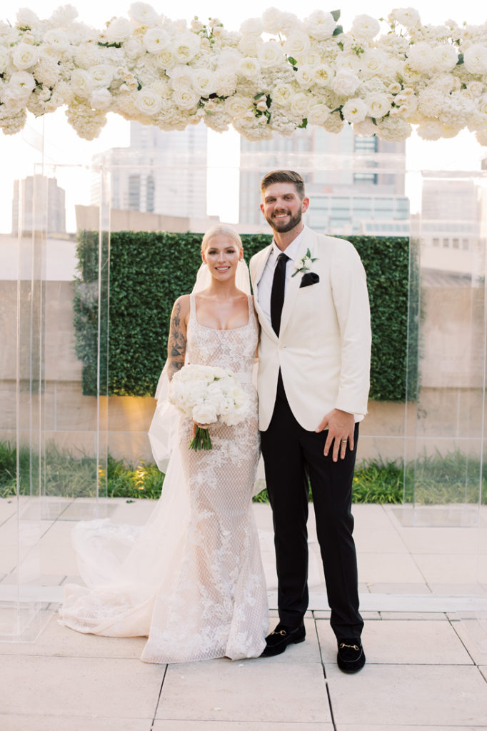 Bride and groom portrait in front of Nashville skyline.