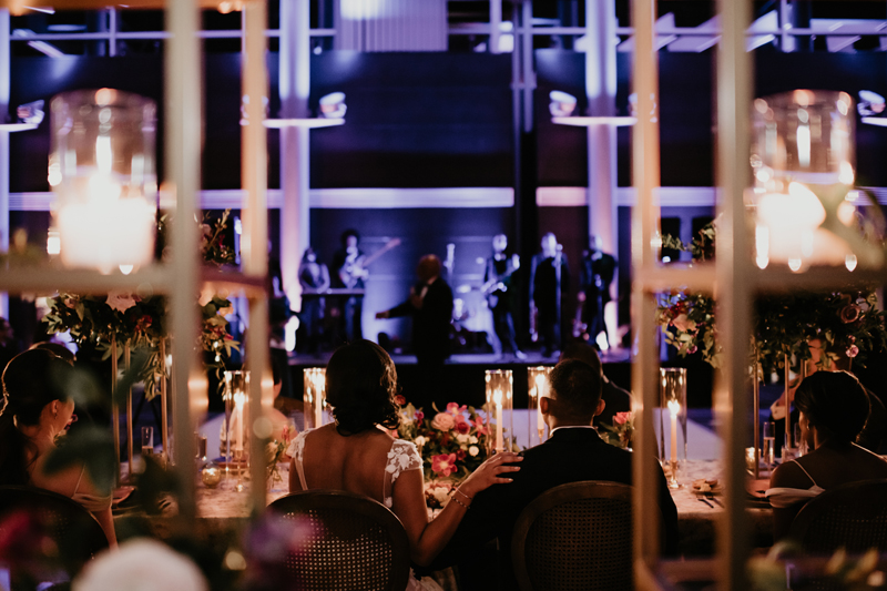 Bride and groom viewing band at The Science Museum of Virginia wedding reception